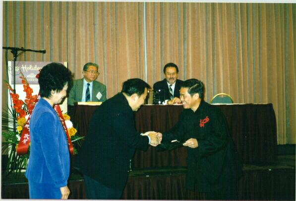 Sifu Wong receiving the Qigong Master of the Year award